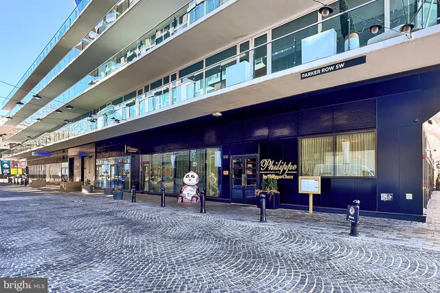 a view of a building with a street