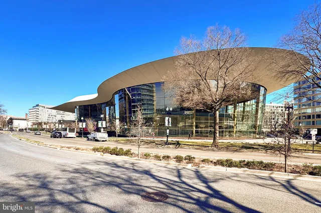 a front view of a building with glass windows