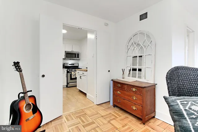 a bedroom with furniture and window