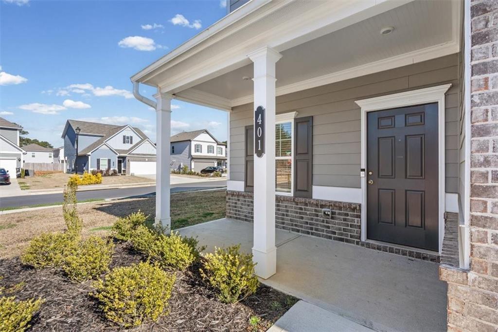 401 Larry Lane Adairsville, GA 30103 - Photo 2 of 41 a view of a porch with a bench and potted plants