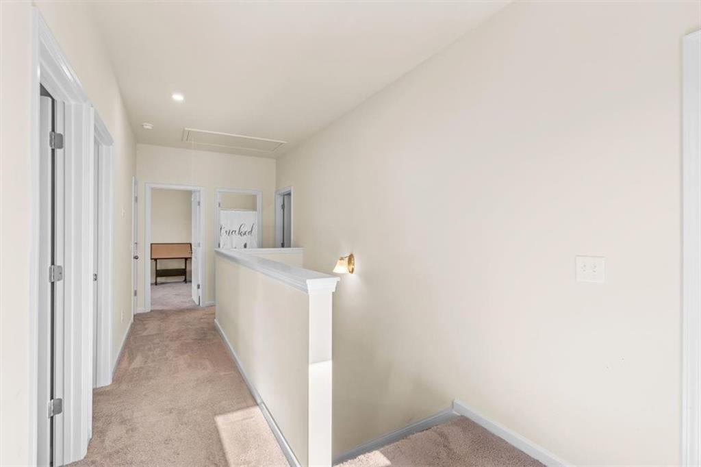 401 Larry Lane Adairsville, GA 30103 - Photo 21 of 41 a view of a hallway with bathroom and white walls