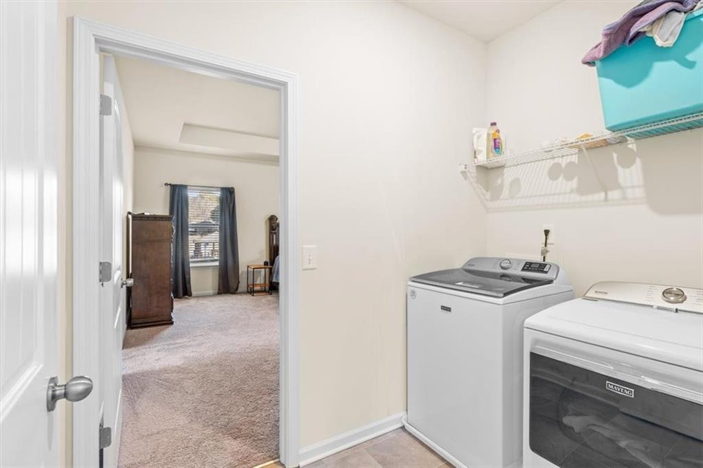 401 Larry Lane Adairsville, GA 30103 - Photo 22 of 41 a view of a storage & utility room with dryer and washer