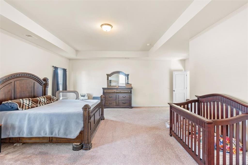 401 Larry Lane Adairsville, GA 30103 - Photo 24 of 41 a bedroom with furniture and a window