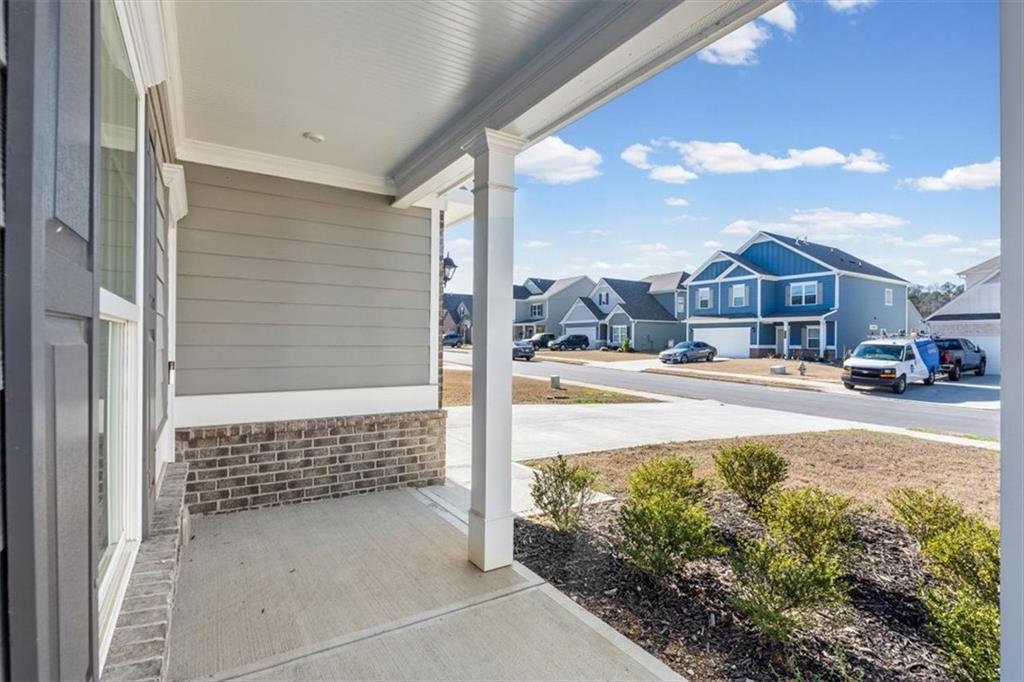 401 Larry Lane Adairsville, GA 30103 - Photo 3 of 41 a view of a brick house with a large trees