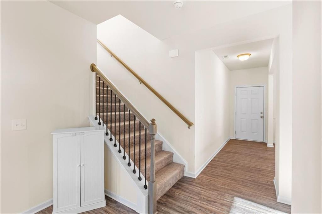 401 Larry Lane Adairsville, GA 30103 - Photo 31 of 41 a view of a hallway with wooden floor and entryway