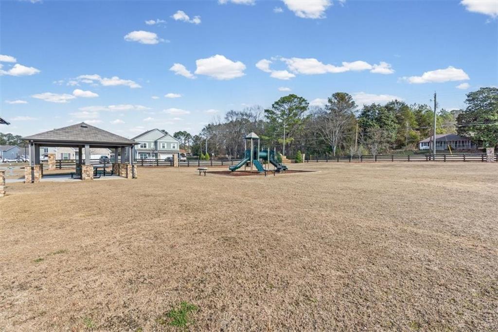 401 Larry Lane Adairsville, GA 30103 - Photo 38 of 41 a backyard of a house with table and chairs