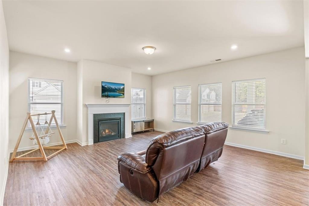 401 Larry Lane Adairsville, GA 30103 - Photo 7 of 41 a living room with furniture and a fireplace