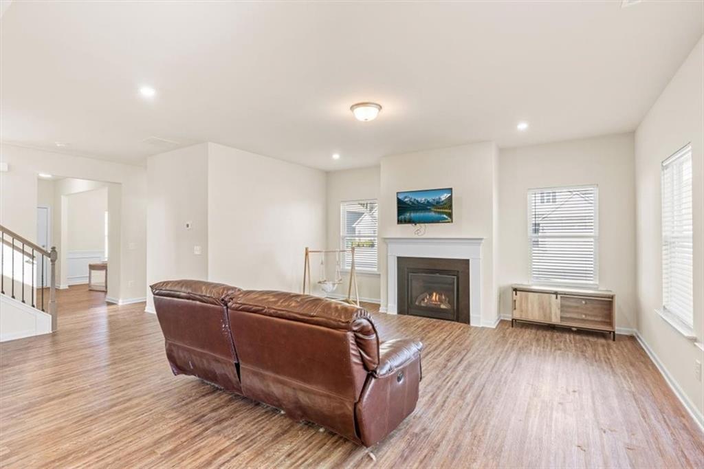 401 Larry Lane Adairsville, GA 30103 - Photo 8 of 41 a living room with furniture and a fireplace