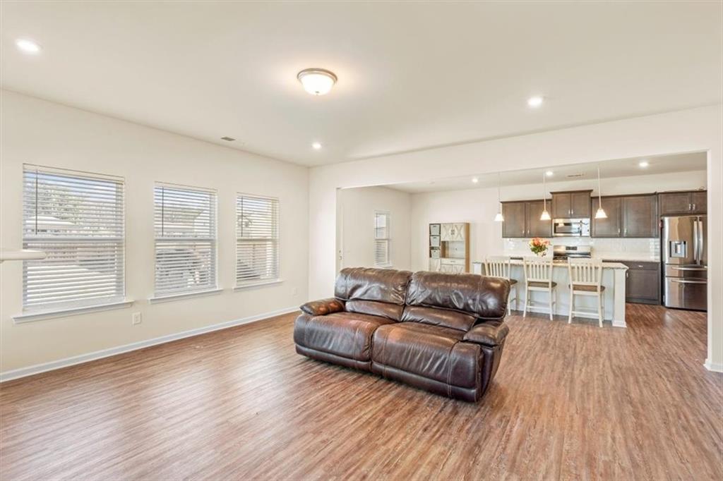 401 Larry Lane Adairsville, GA 30103 - Photo 9 of 41 a living room with furniture and a large window