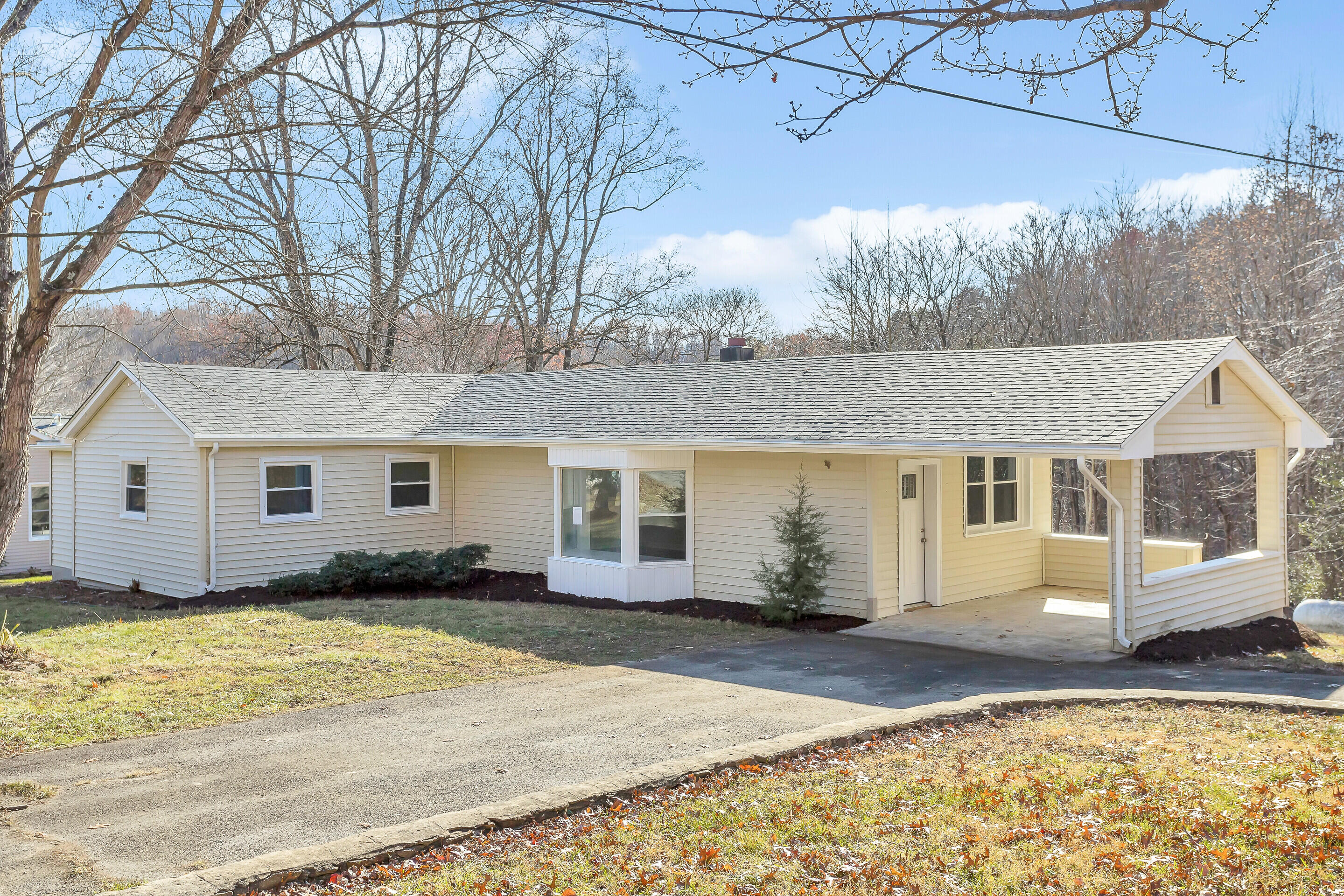 3757 Rutrough Road Southeast Roanoke, VA 24014 - Photo 1 of 42 a front view of a house with a yard