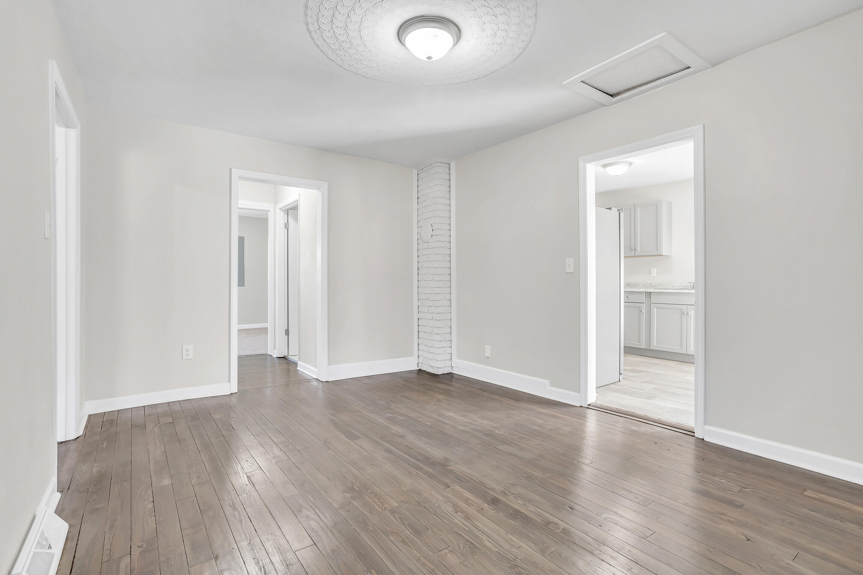 3757 Rutrough Road Southeast Roanoke, VA 24014 - Photo 15 of 42 an empty room with wooden floor & closet and windows