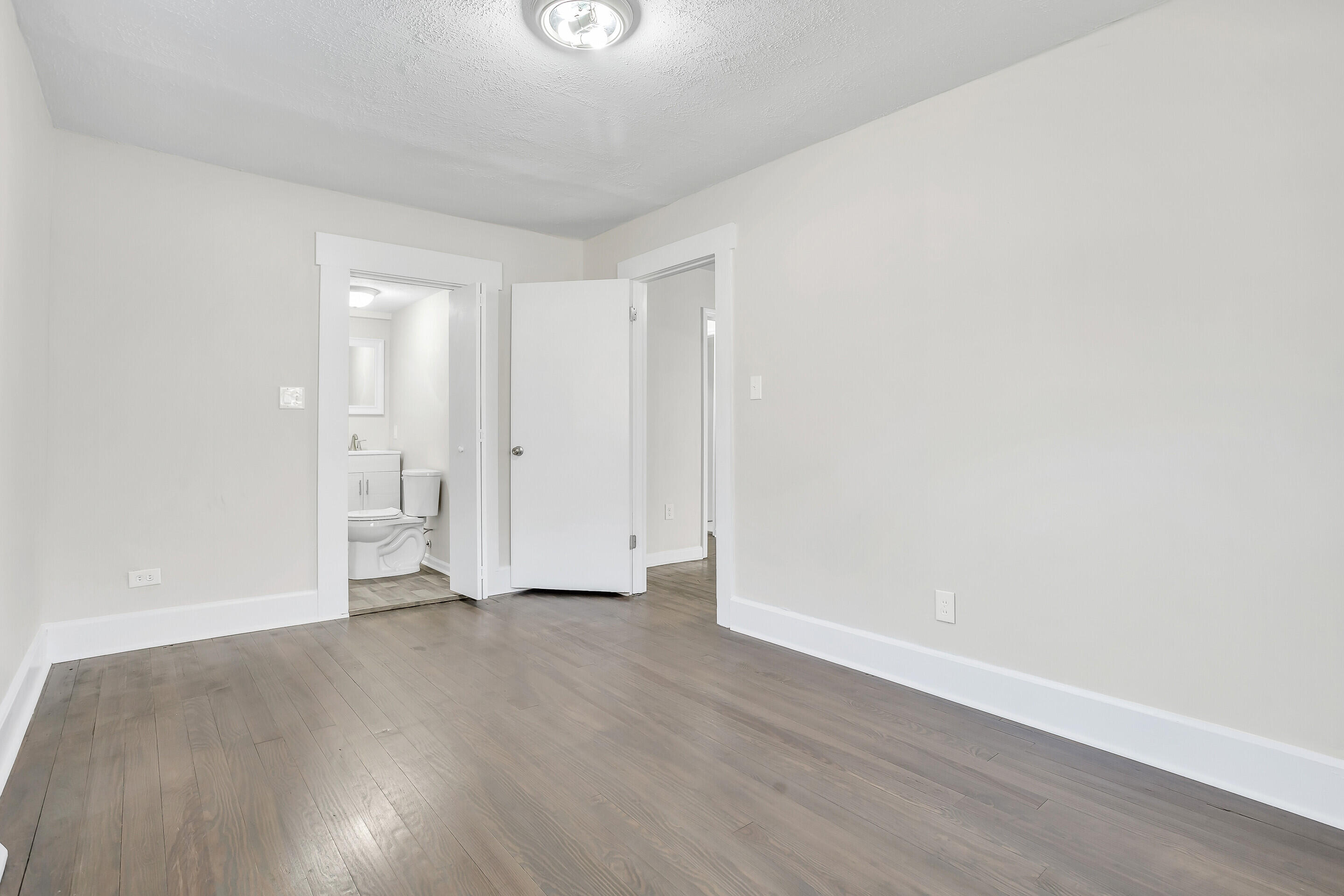 3757 Rutrough Road Southeast Roanoke, VA 24014 - Photo 18 of 42 an empty room with wooden floor