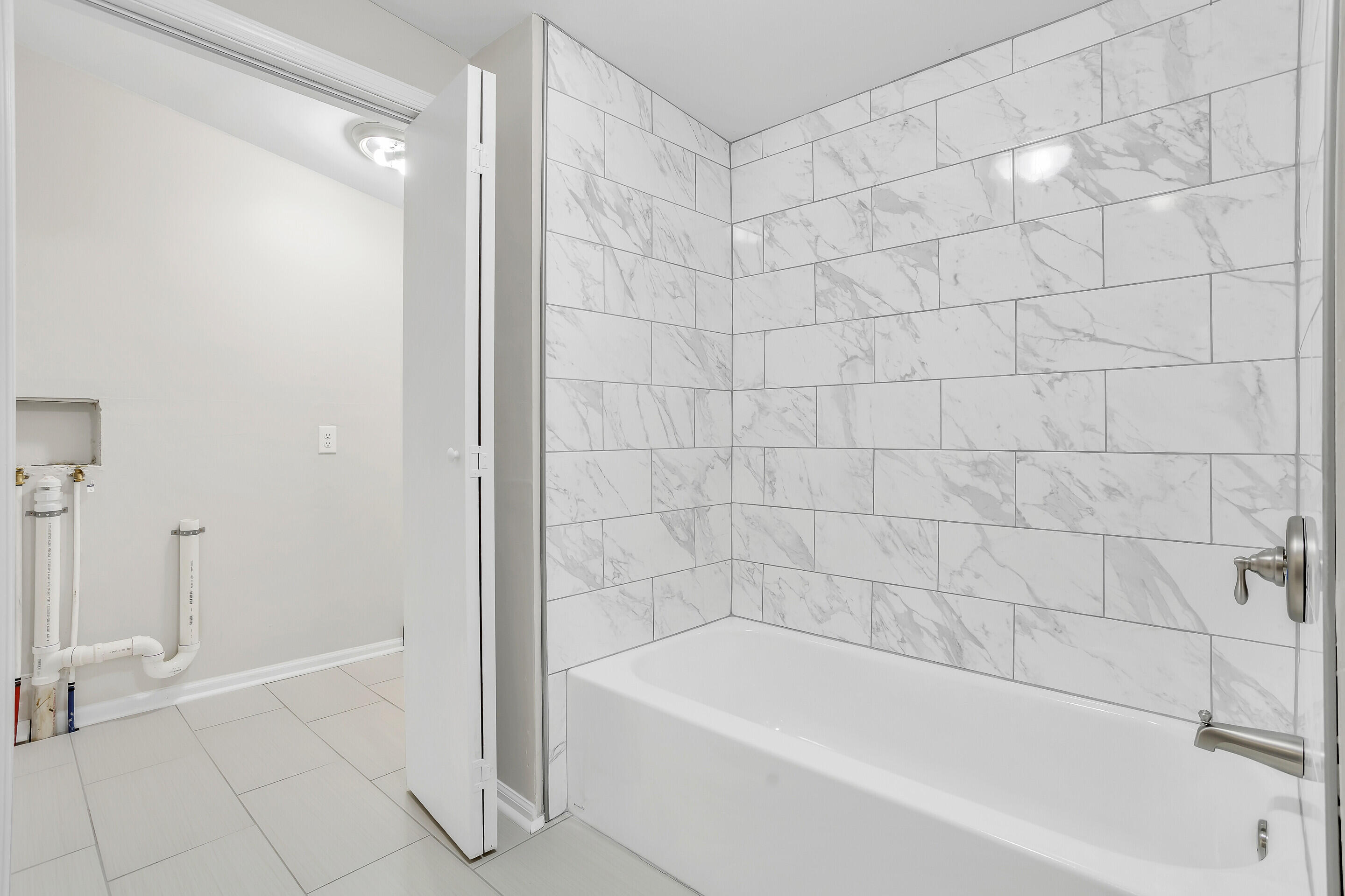 3757 Rutrough Road Southeast Roanoke, VA 24014 - Photo 21 of 42 a bathroom with a bathtub