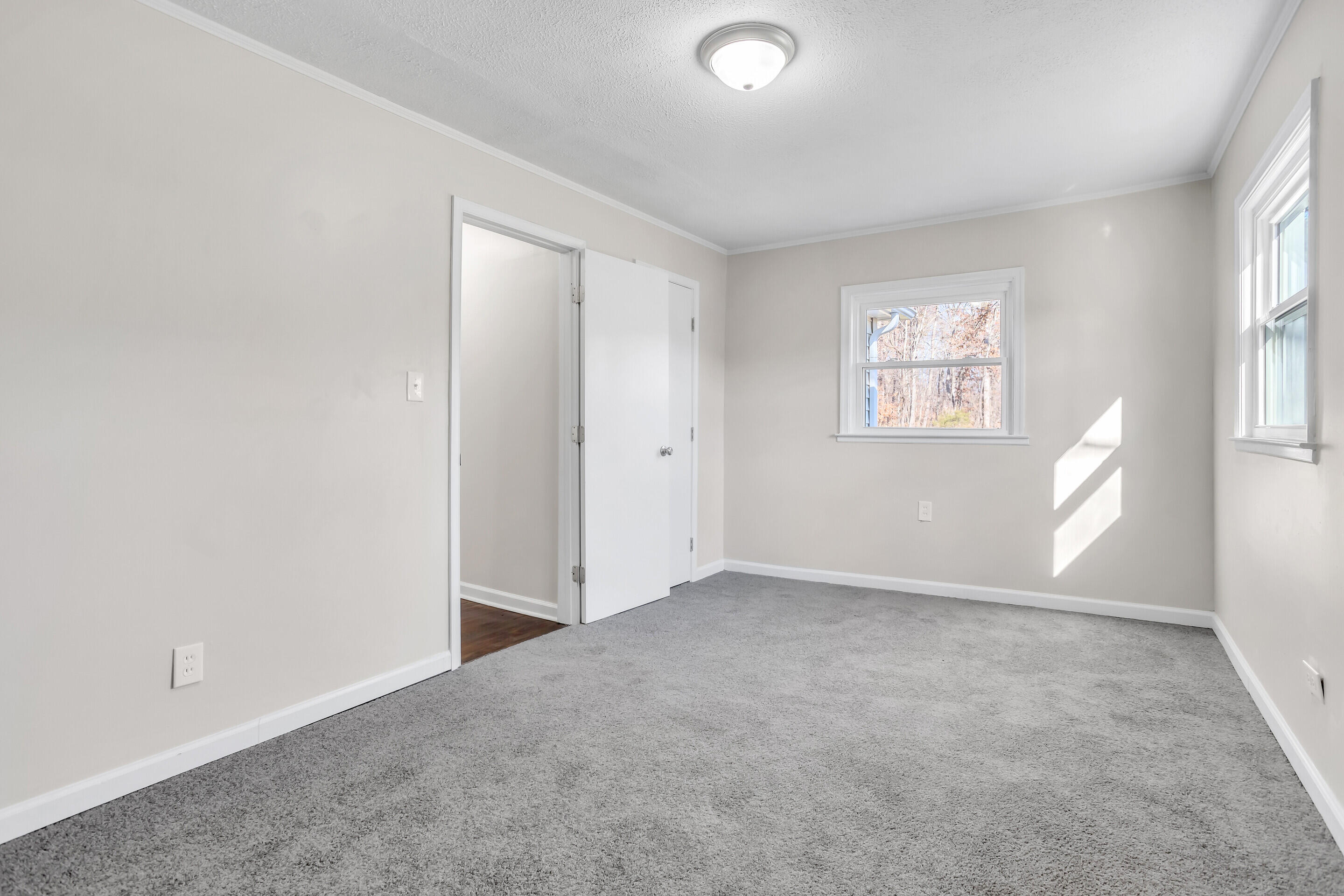 3757 Rutrough Road Southeast Roanoke, VA 24014 - Photo 24 of 42 an empty room with windows