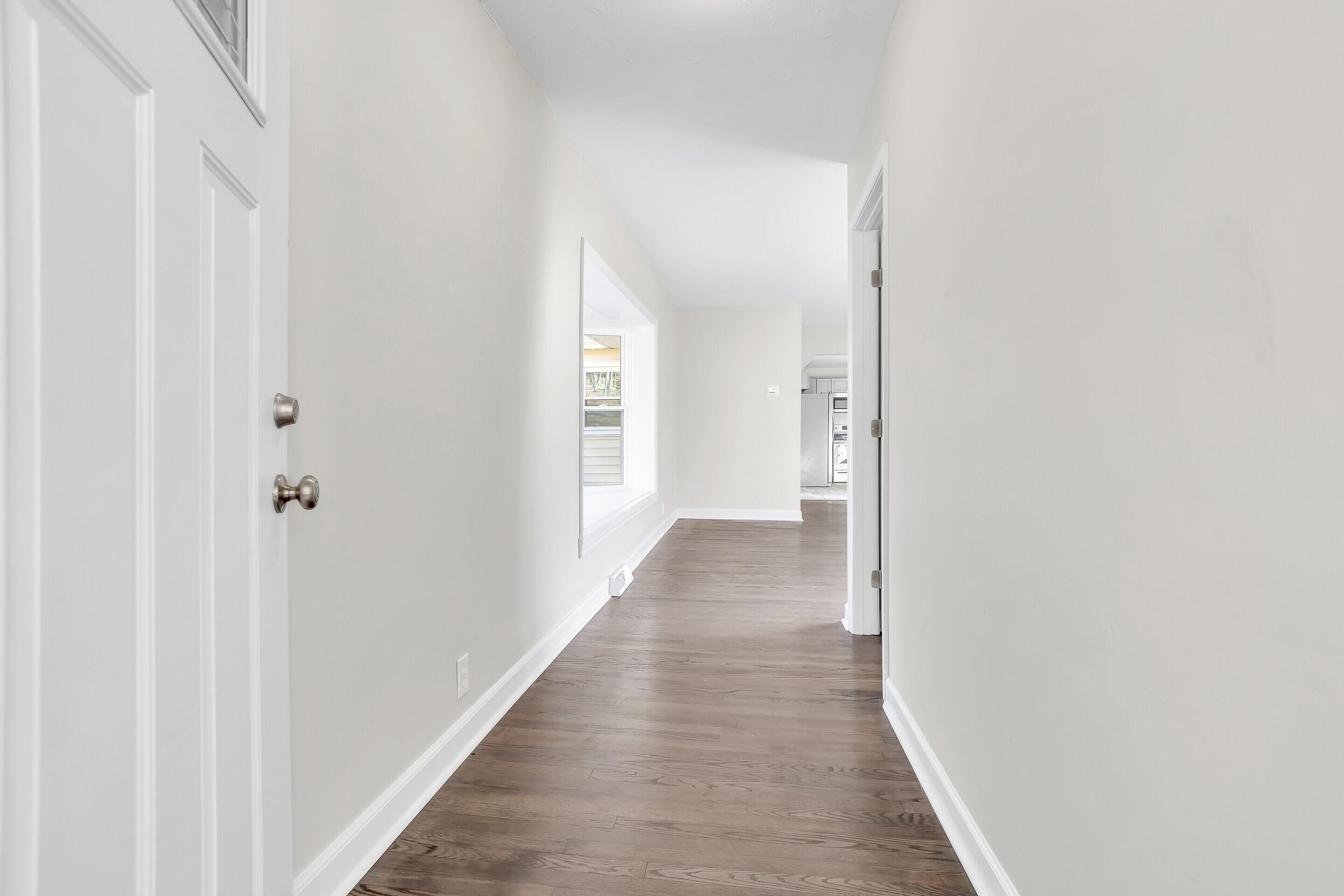 3757 Rutrough Road Southeast Roanoke, VA 24014 - Photo 4 of 42 a view of a hallway with wooden floor