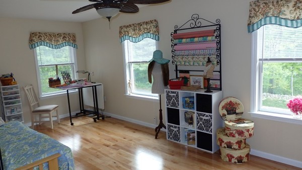 489 Market Hill Road Amherst, MA 01002 - Photo 21 of 27 a view of a workspace with furniture and a window