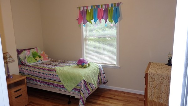 489 Market Hill Road Amherst, MA 01002 - Photo 23 of 27 a bedroom with a bed and a window