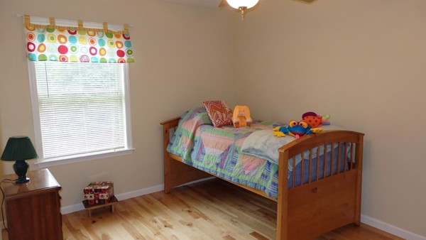 489 Market Hill Road Amherst, MA 01002 - Photo 24 of 27 a bedroom with a bed and a window