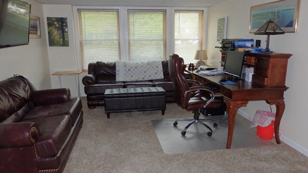 489 Market Hill Road Amherst, MA 01002 - Photo 26 of 27 a livingroom with workspace and a window