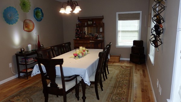 489 Market Hill Road Amherst, MA 01002 - Photo 10 of 27 a view of a dining room with furniture and window