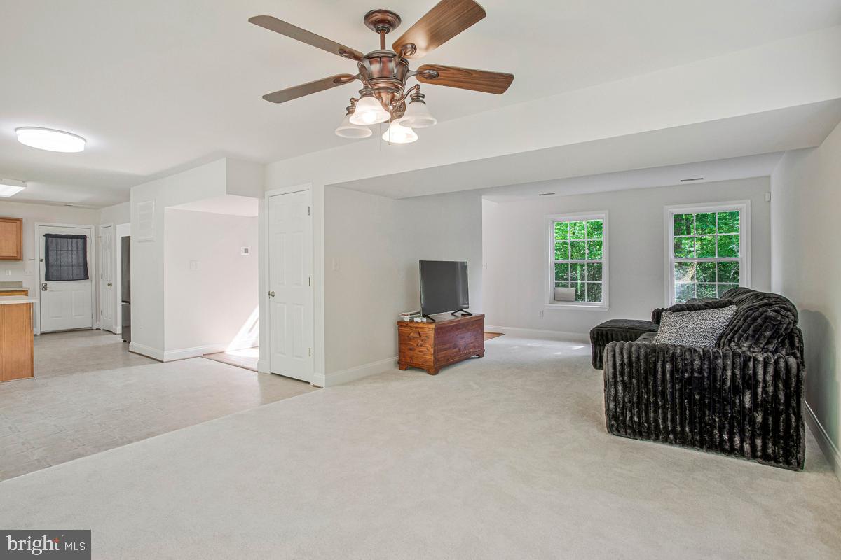 6098 Fir Road St. Leonard, MD 20685 - Photo 11 of 25 Spacious living area with natural light.