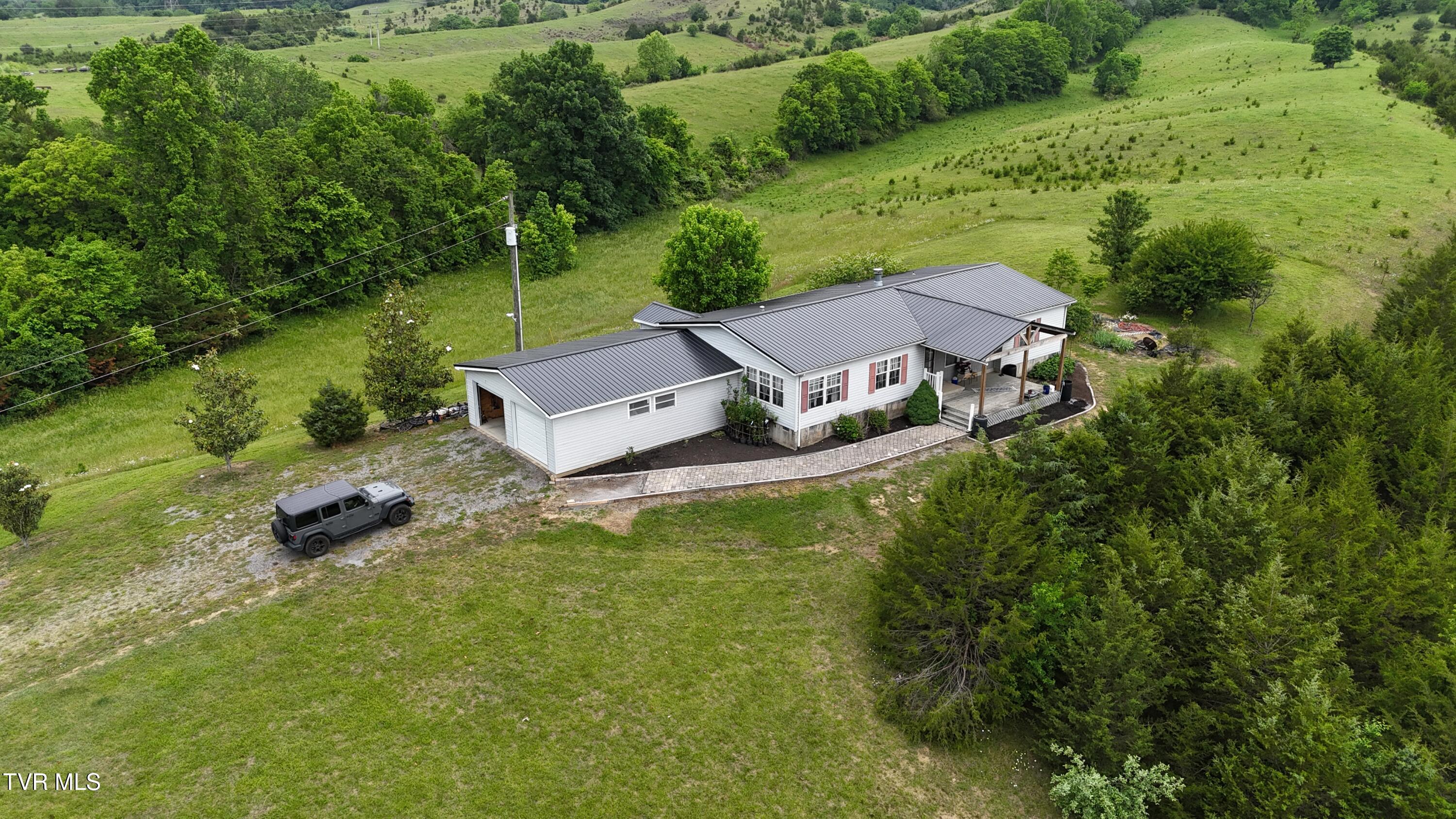 1168 Webster Valley Road Rogersville, TN 37857 - Photo 4 of 59 dji_fly_20250519_153540_0029_17476837438
