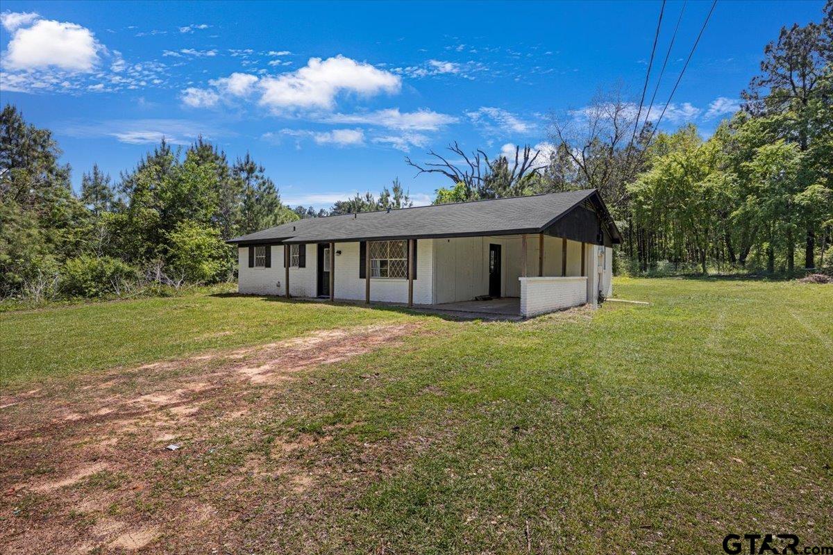 10638 County Road 384 Tyler, TX 75708 - Photo 1 of 33 a view of a house with a yard