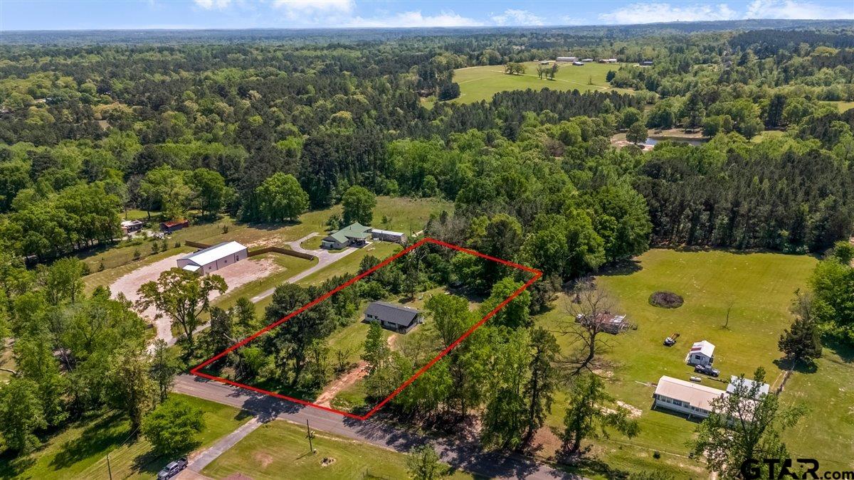 10638 County Road 384 Tyler, TX 75708 - Photo 30 of 33 an aerial view of residential houses with outdoor space