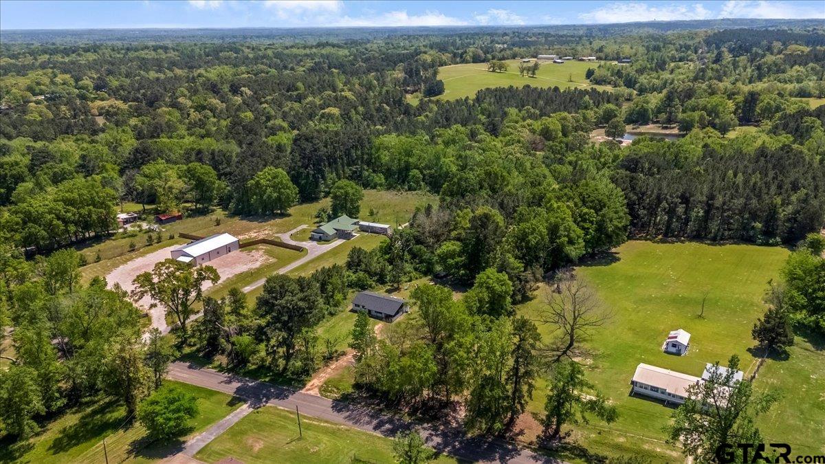 10638 County Road 384 Tyler, TX 75708 - Photo 31 of 33 an aerial view of residential houses with outdoor space