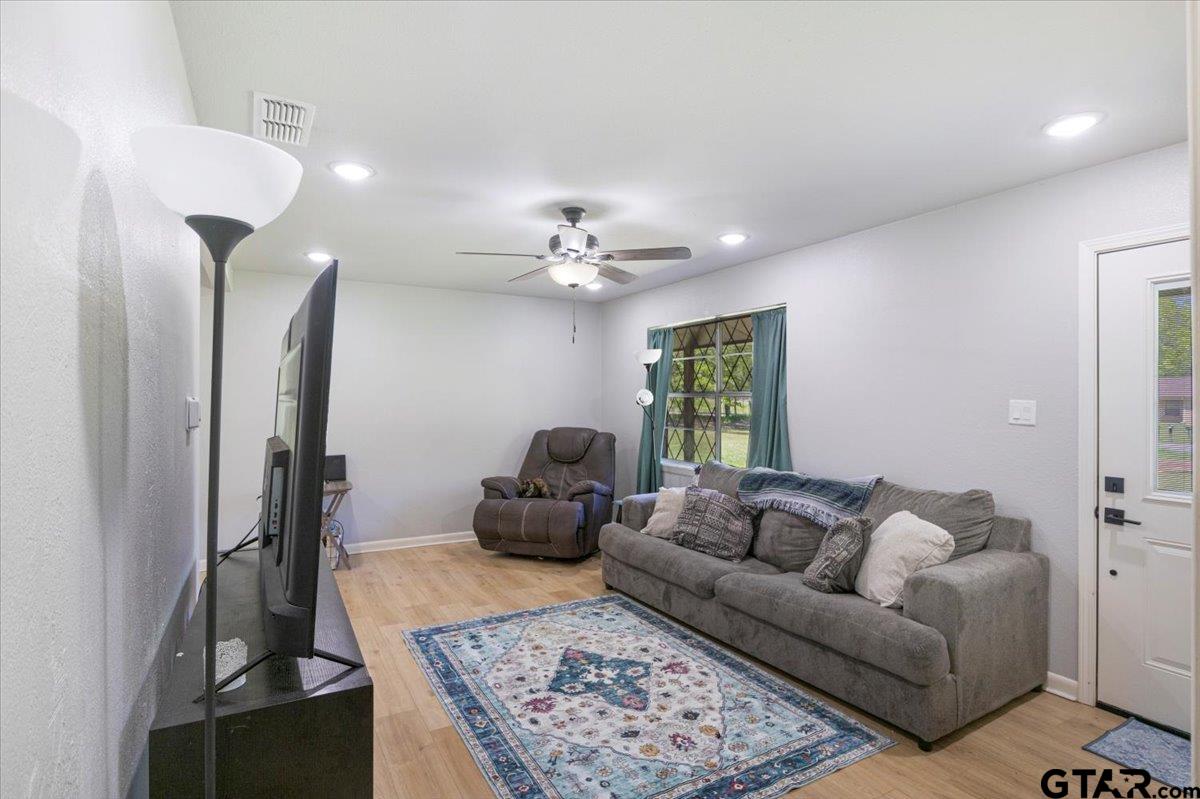 10638 County Road 384 Tyler, TX 75708 - Photo 4 of 33 a living room with furniture and a rug