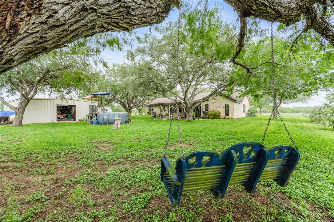 345 Trail Ridge Drive Sandia, TX 78383 - Photo 16 of 40 a view of a house with a yard