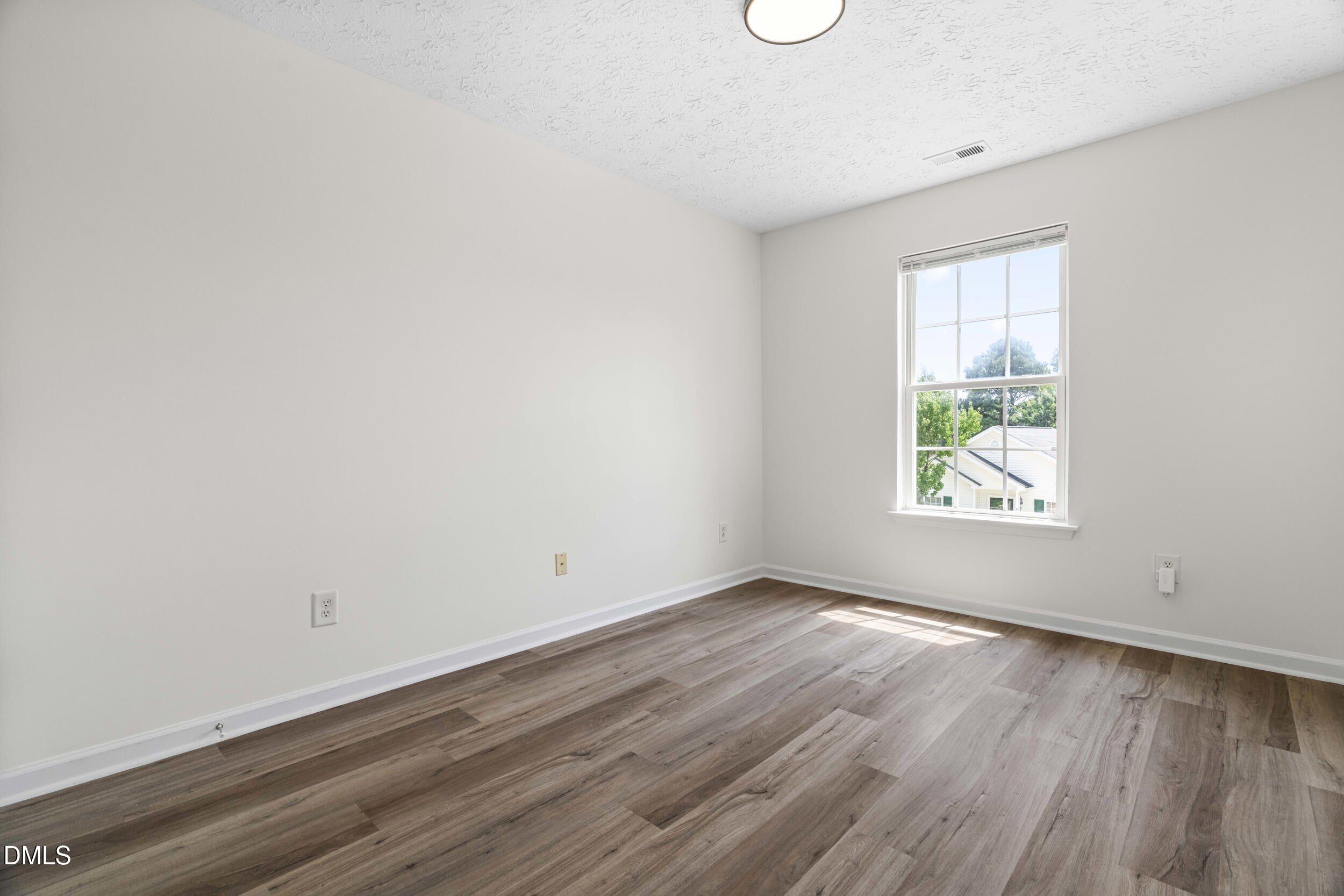 4121 Tensity Drive Raleigh, NC 27604 - Photo 20 of 34 Additional bedroom - ideal for guests, kids or a home office