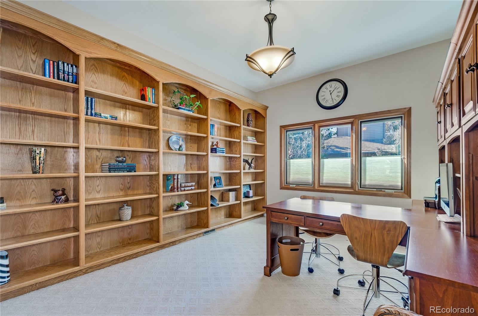 83 North Ranch Road Littleton, CO 80127 - Photo 18 of 35 a view of a livingroom with furniture and a window