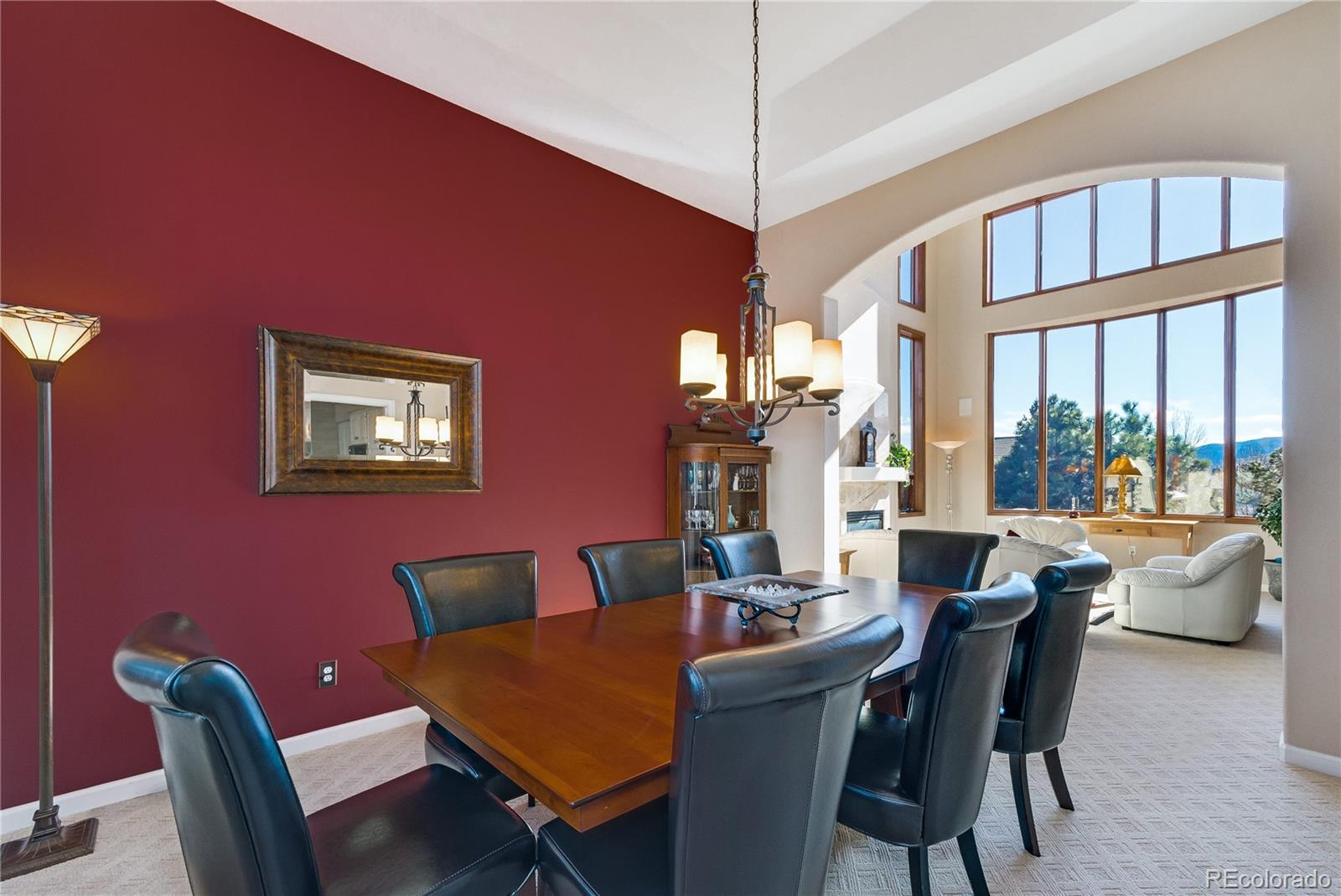 83 North Ranch Road Littleton, CO 80127 - Photo 8 of 35 a view of a dining room with furniture window and outside view