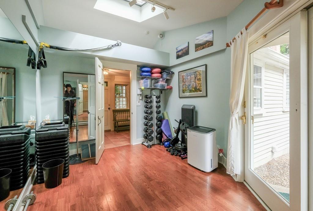83 Claypit Hill Road Wayland, MA 01778 - Photo 19 of 33 a view of a hallway with workspace and window