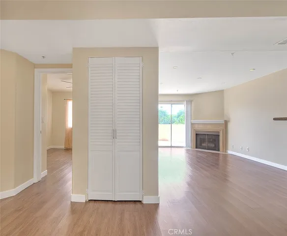 a view of a hallway with washer and dryer