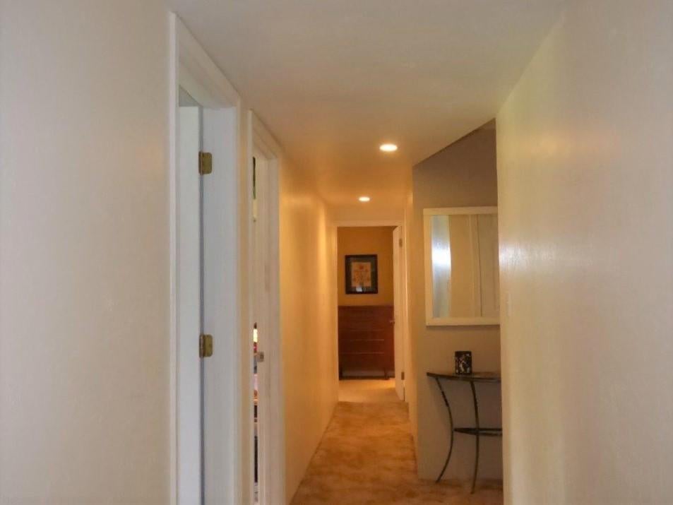 1068 Wards Creek Road Rogue River, OR 97537 - Photo 32 of 57 Hallway to the 3 bedrooms and guest bathroom, downstairs.