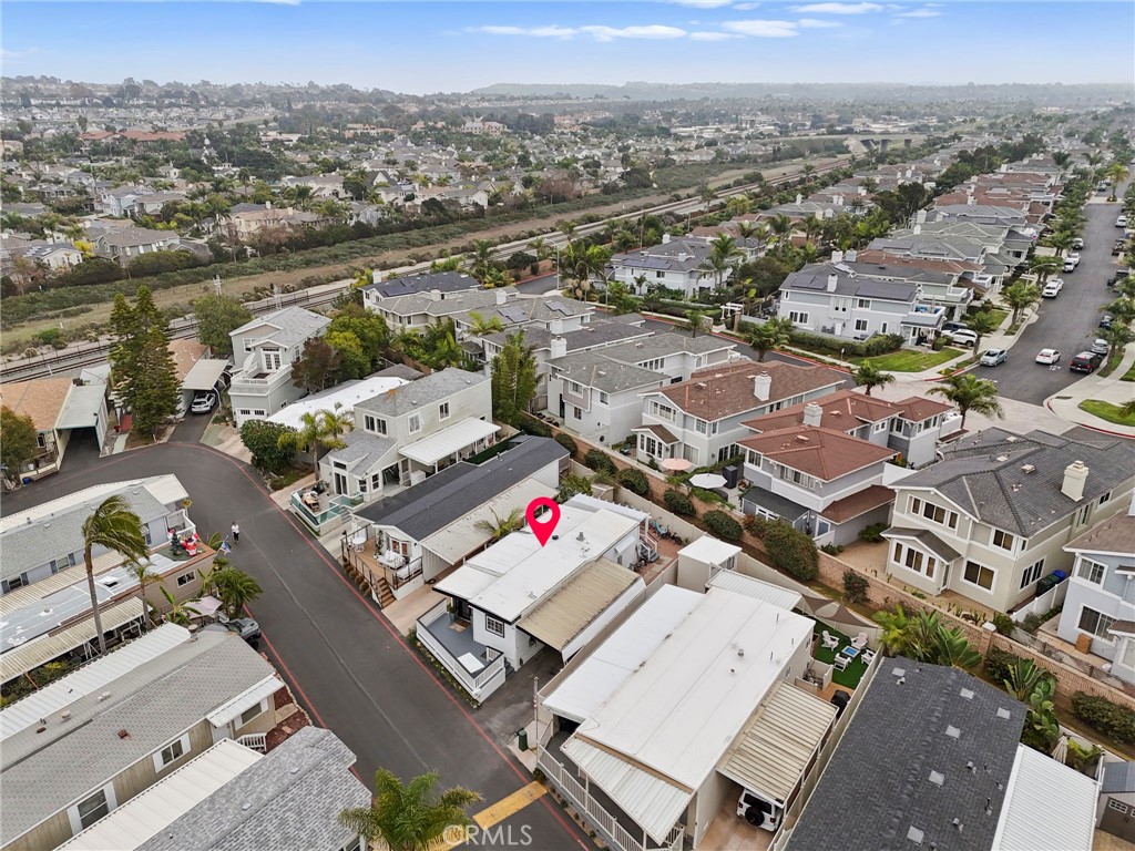 6550 Ponto Drive, Unit 17 Carlsbad, CA 92011 - Photo 41 of 48 an aerial view of a city with lots of residential buildings