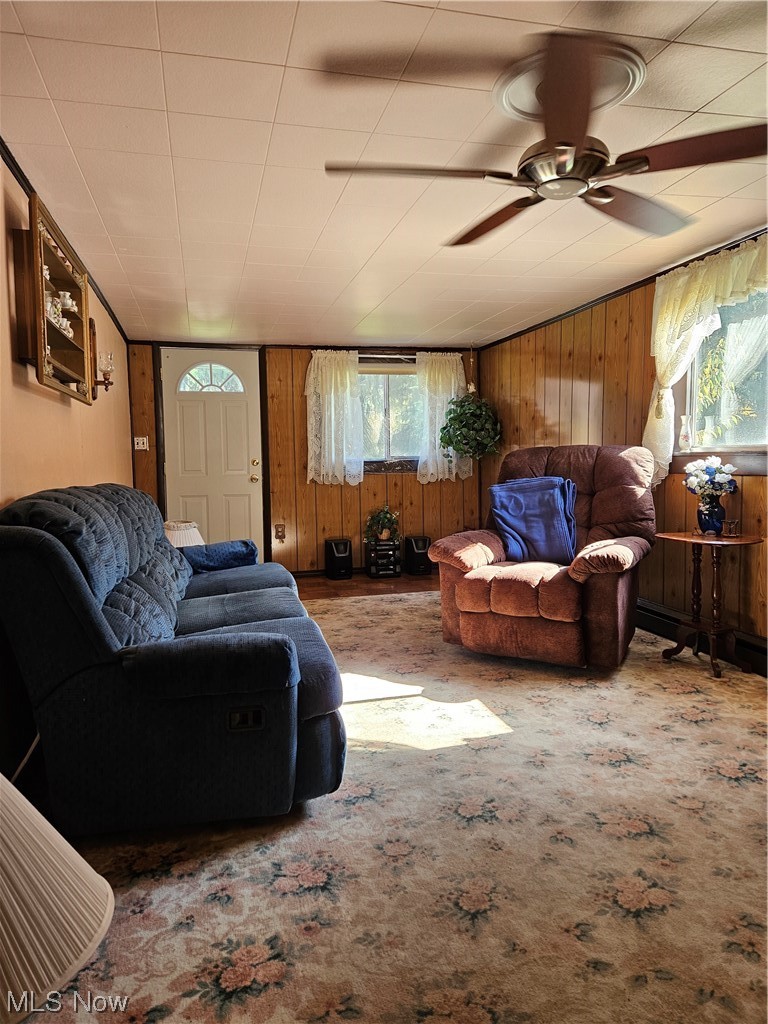 6700 Ledge Road Thompson, OH 44086 - Photo 6 of 15 Living room with a wealth of natural light, ceiling fan, and wood parquet floors.