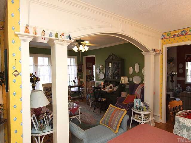 5516 Swiftbrook Circle Raleigh, NC 27606 - Photo 2 of 10 Note the lovely archway between the dining/den area and breakfast area!