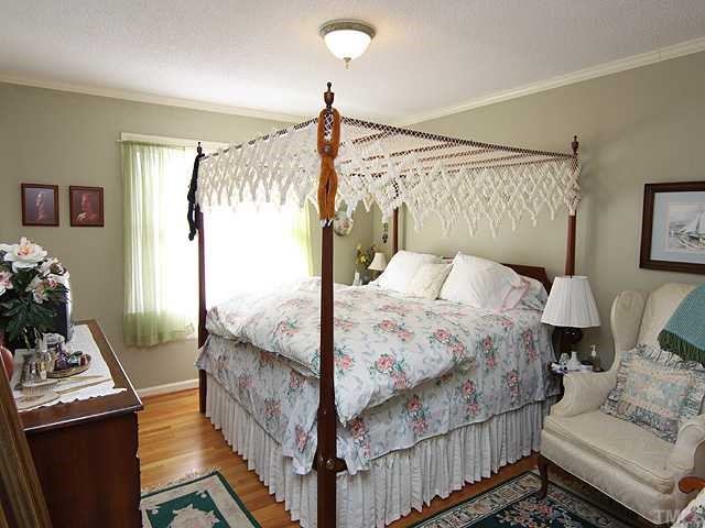 5516 Swiftbrook Circle Raleigh, NC 27606 - Photo 7 of 10 Spacious master suite with hardwood floors...