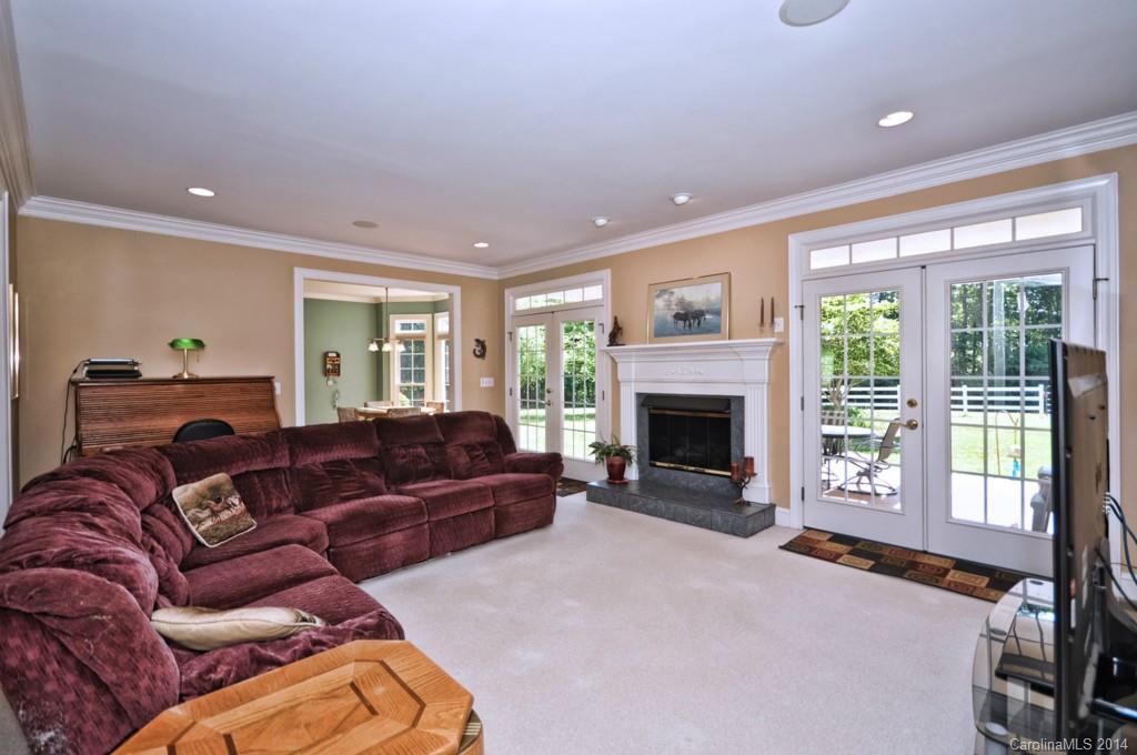 5406 Morgan Mill Road, Unit 2 Monroe, NC 28110 - Photo 5 of 23 a living room with furniture window and a fireplace