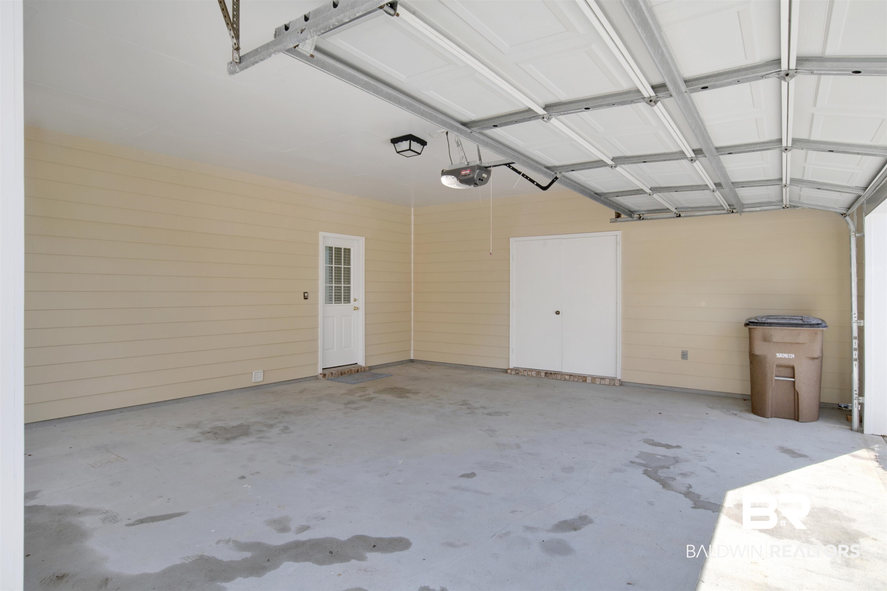 125 Woodruff Court Mobile, AL 36608 - Photo 25 of 27 Garage with a garage door opener
