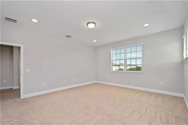 an empty room with windows