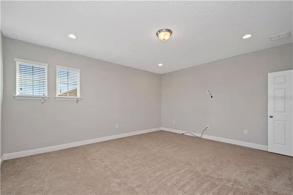 8752 Powder Ridge Trail Windermere, FL 34786 - Photo 19 of 31 an empty room with a window