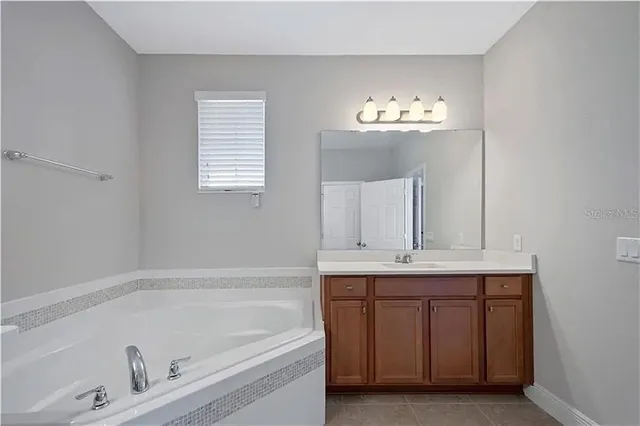 a bathroom with a sink and a bathtub