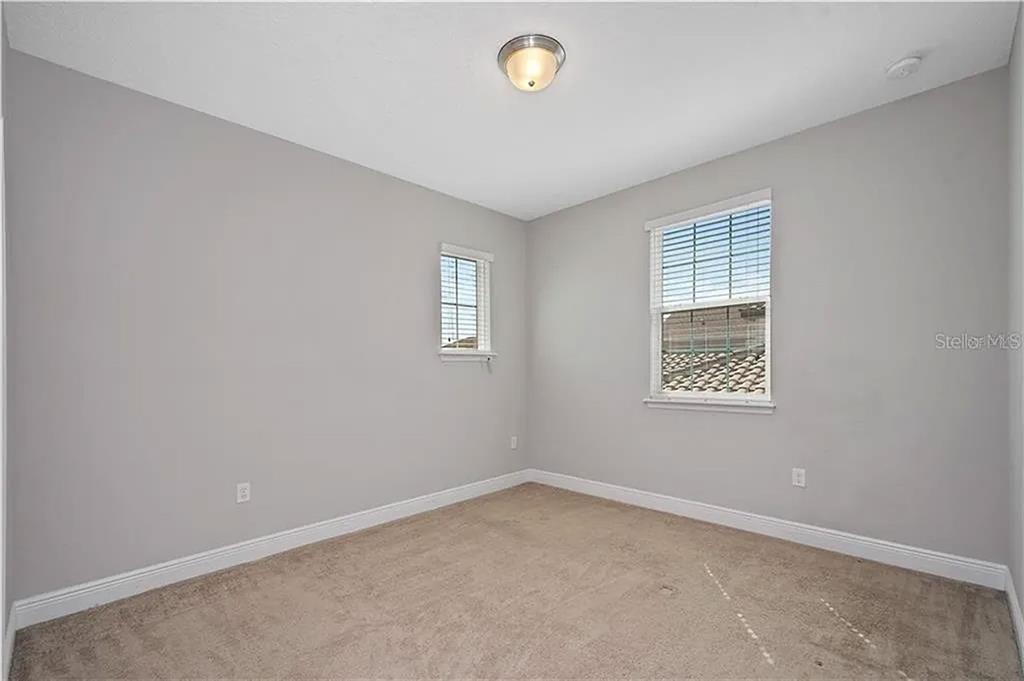 8752 Powder Ridge Trail Windermere, FL 34786 - Photo 26 of 31 an empty room with a window