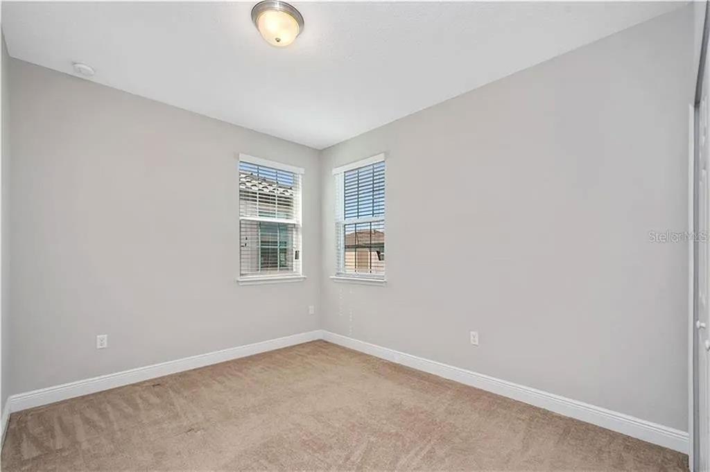 8752 Powder Ridge Trail Windermere, FL 34786 - Photo 28 of 31 an empty room with a window