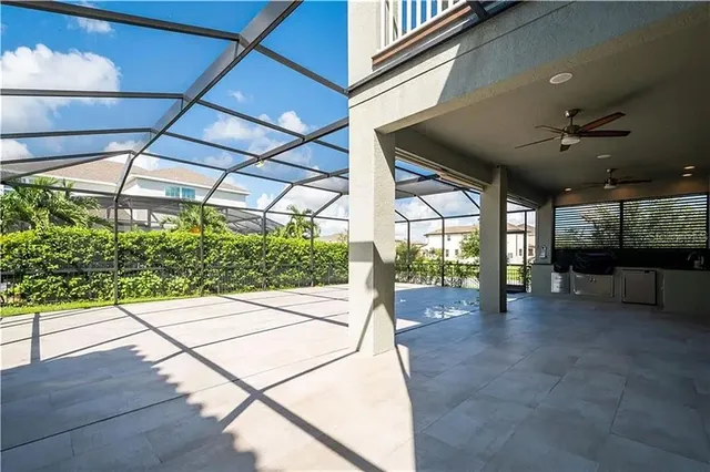 a lobby with furniture and a large window