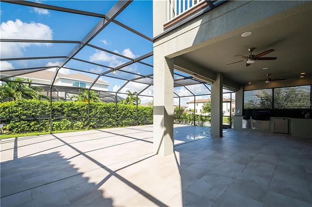 8752 Powder Ridge Trail Windermere, FL 34786 - Photo 29 of 31 a lobby with furniture and a large window